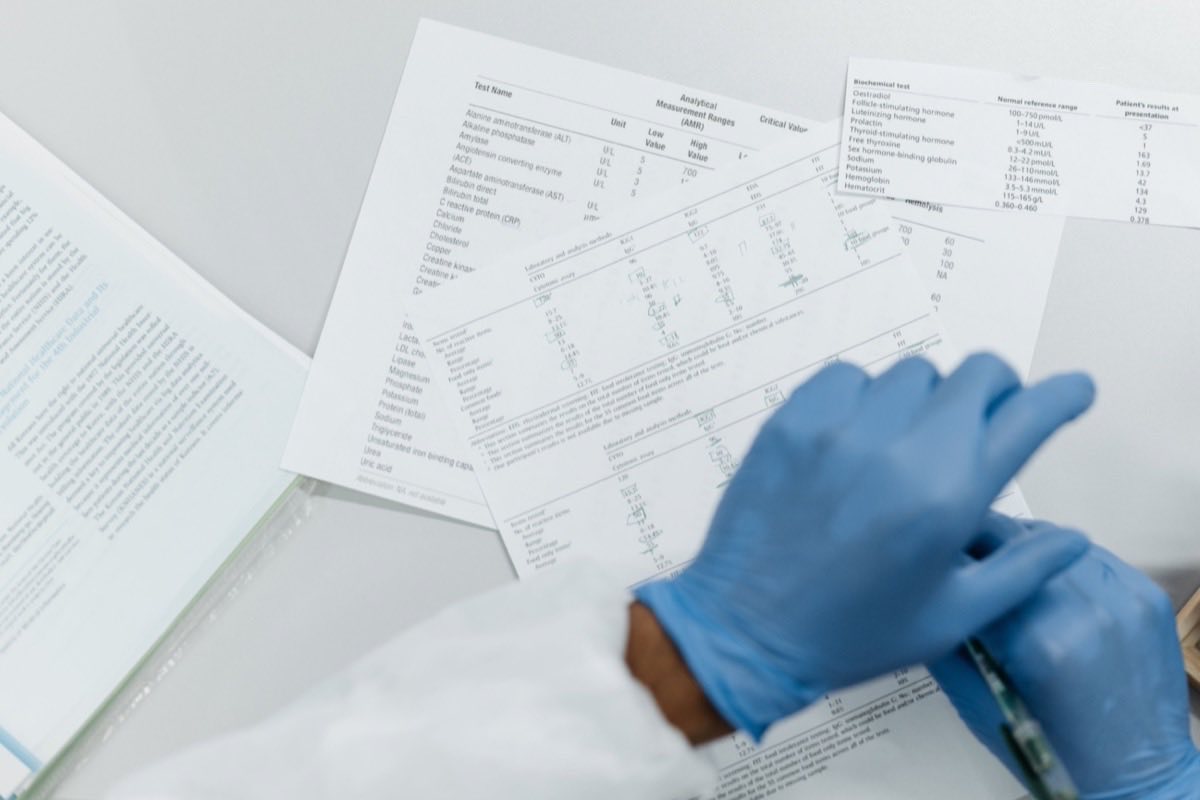 Analyst comparing pharmacokinetic data across two drug products on screen