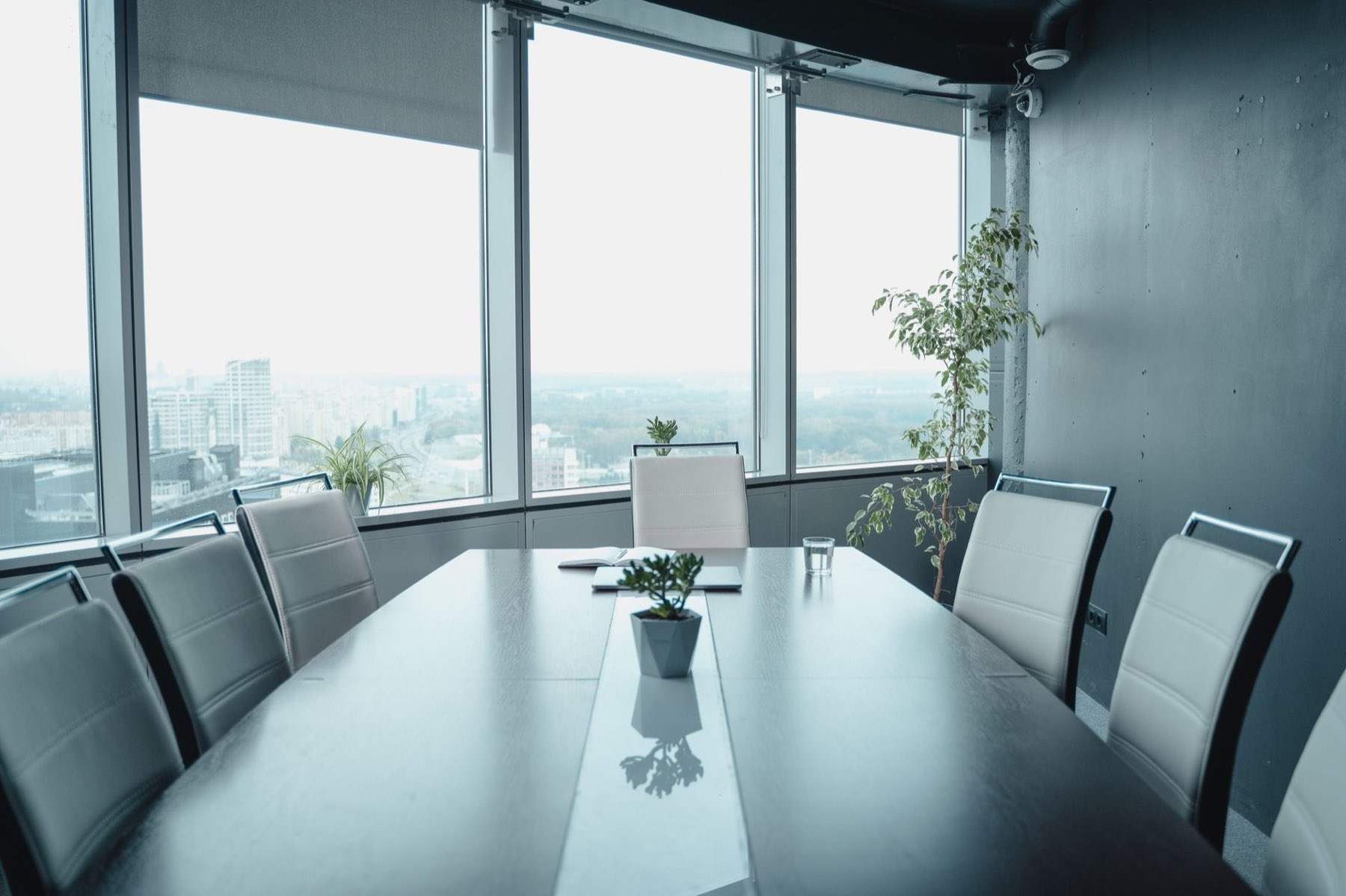 A boardroom overlooking the city skyline