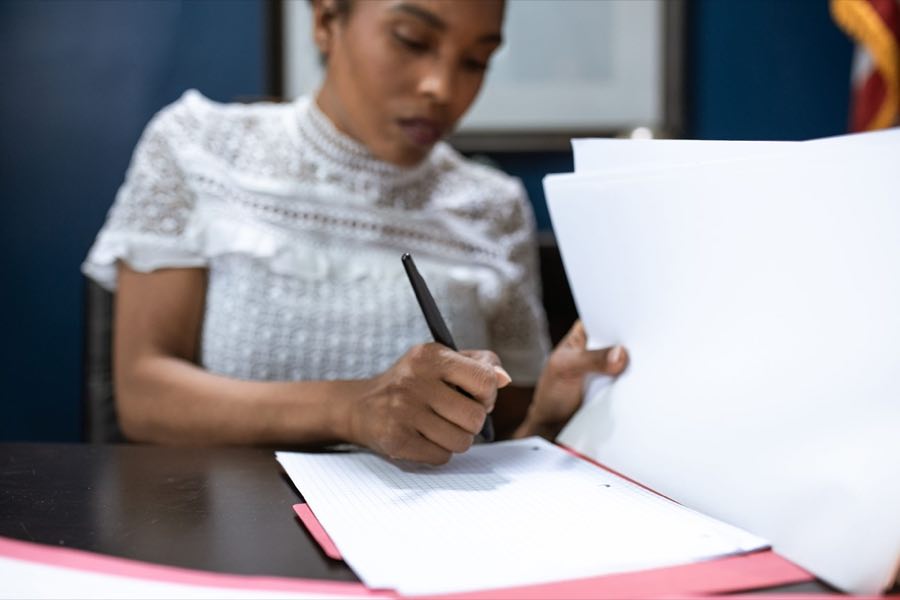 A leader signing off on a decision