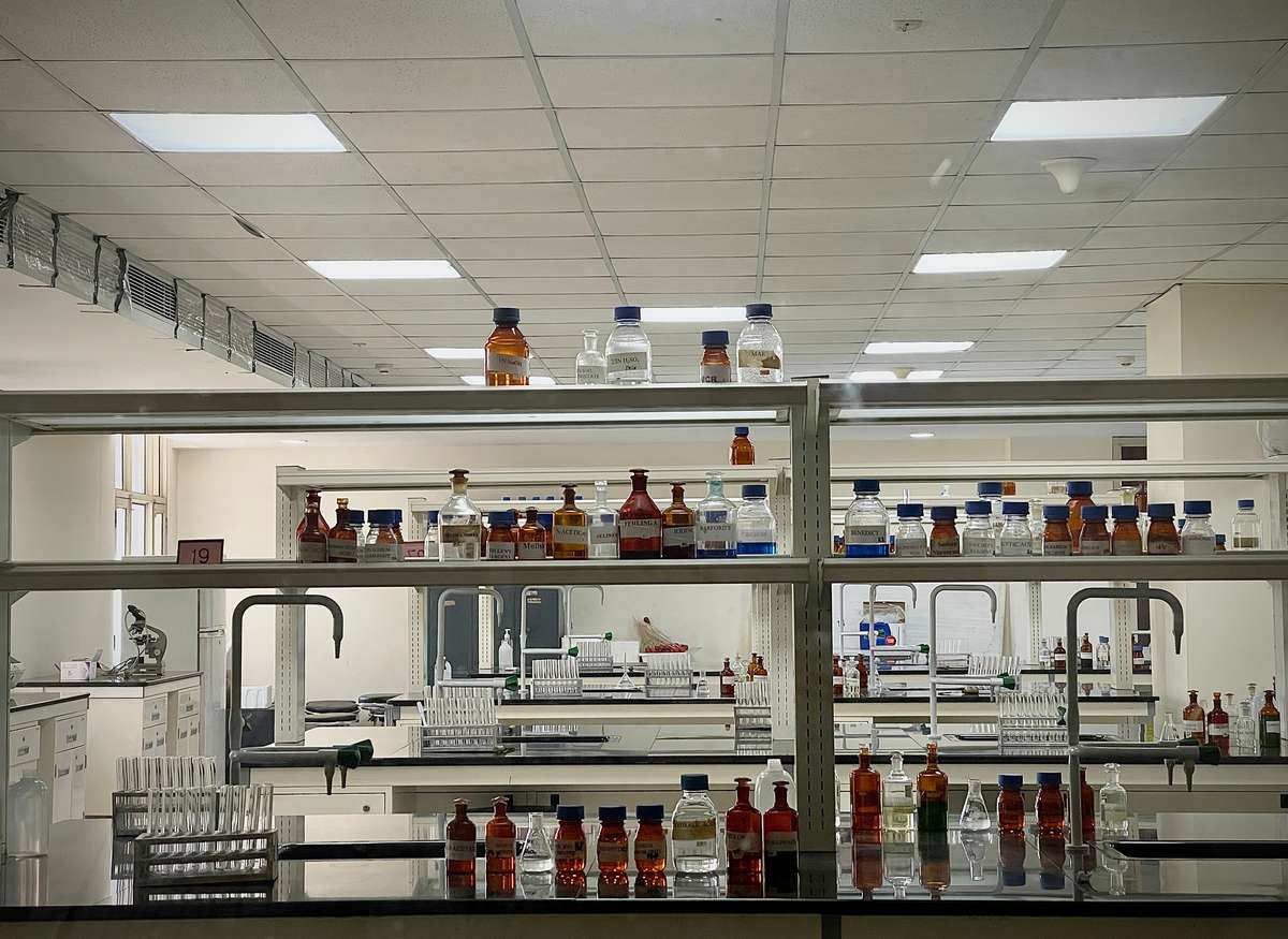 A modern science lab with chemical bottles and equipment