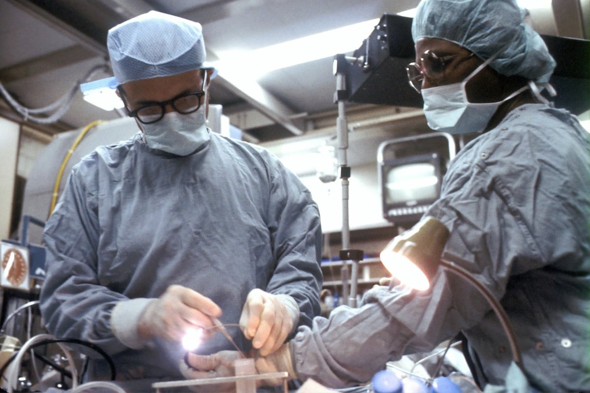 Clinicians at work during a procedure