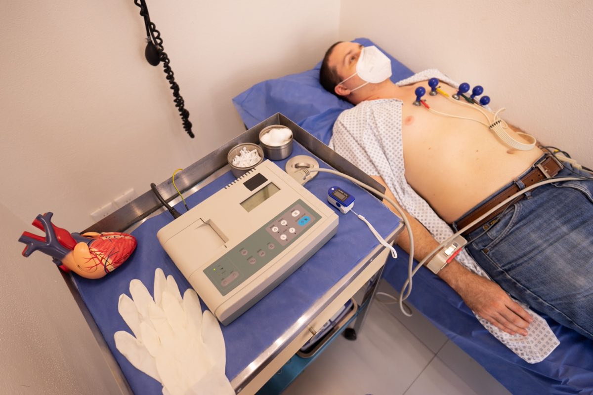 Cardiovascular regulatory scientist reviewing cardiac data