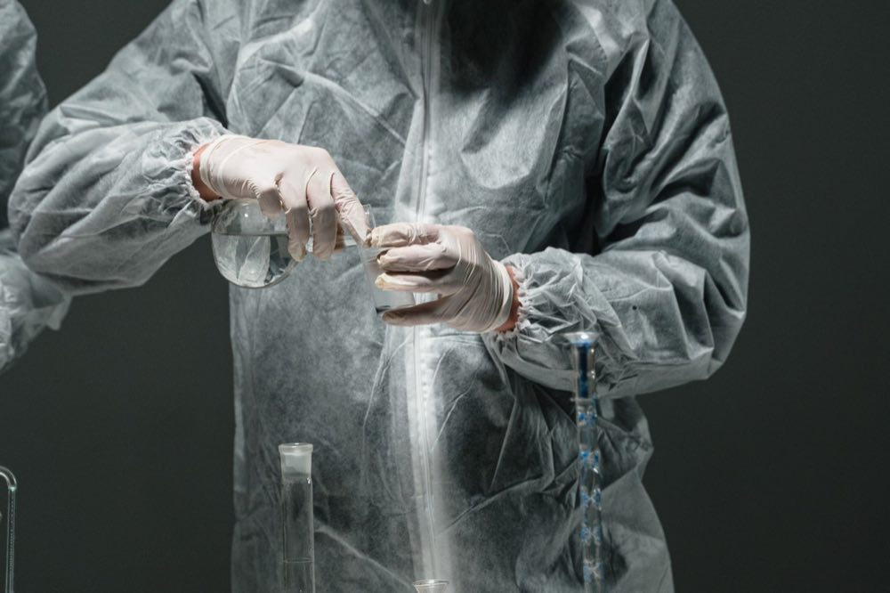 Cell and gene therapy quality scientist gowned for the cleanroom