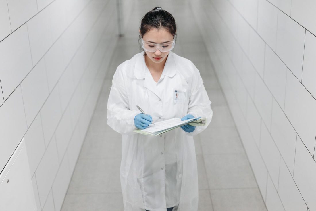 A clinical specialist reviewing device performance records