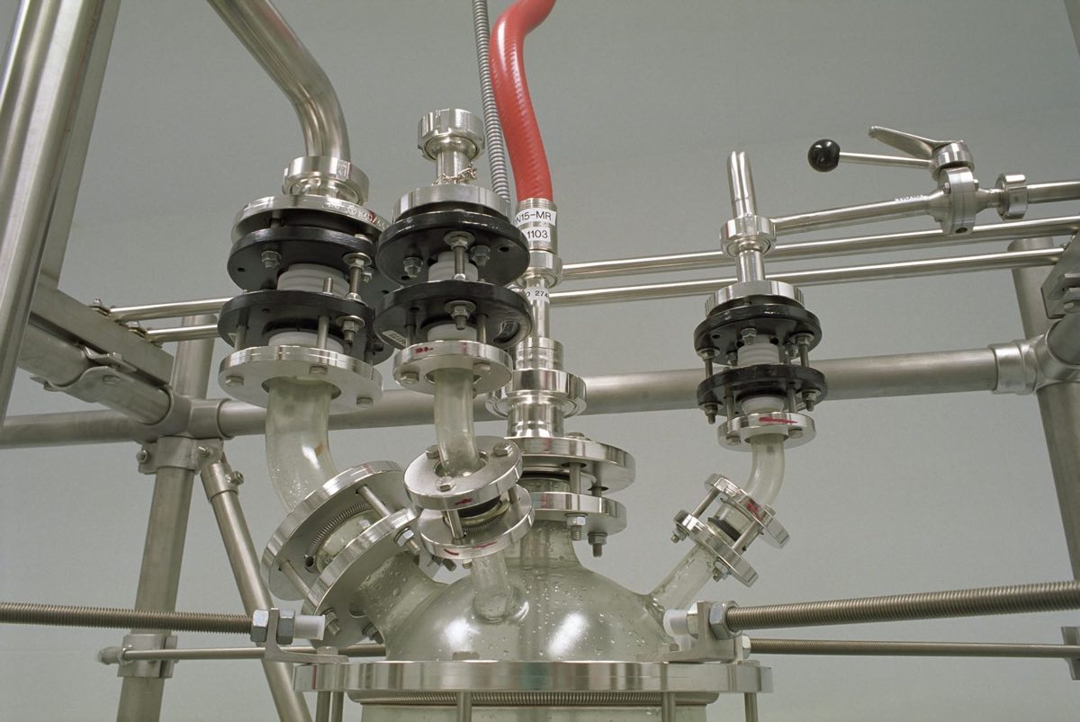 Stainless steel process piping and valves in a production facility