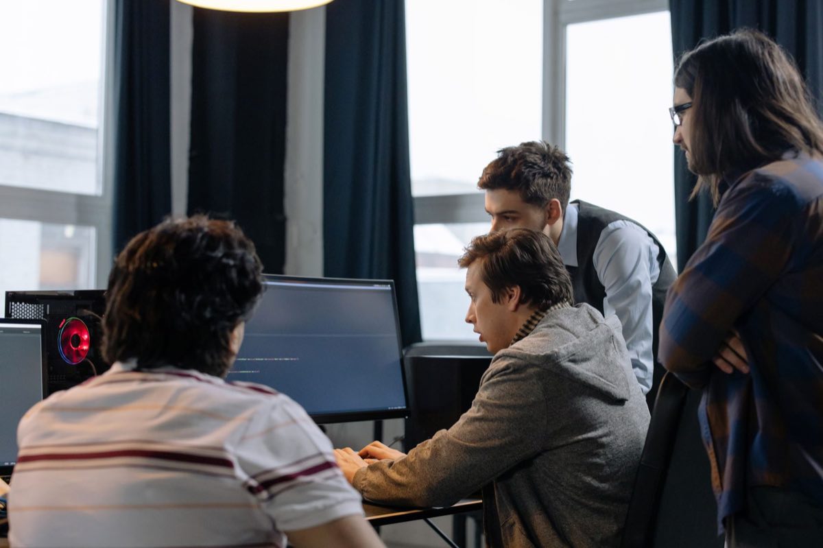 Development team testing software together