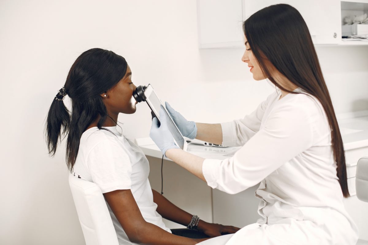 Standardized skin imaging used to score a dermatology endpoint