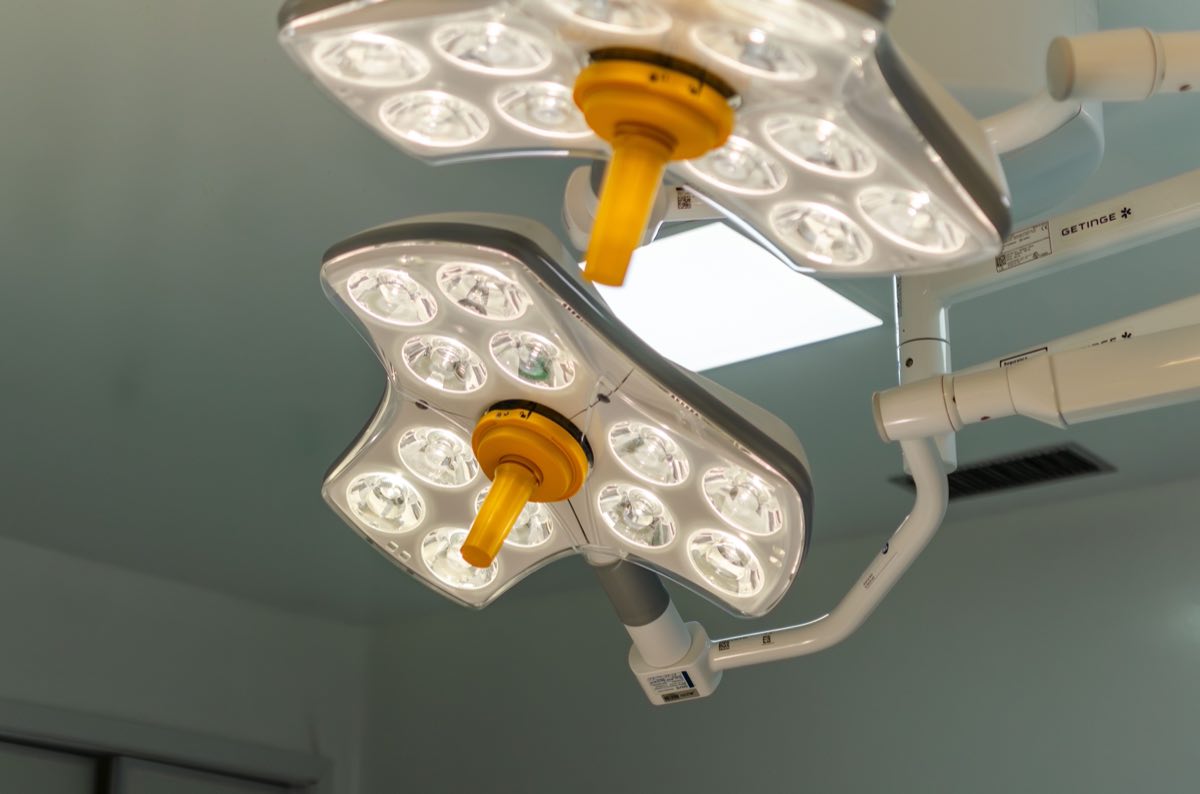 Bright LED surgical lights in a hospital operating room, emphasizing technology and healthcare