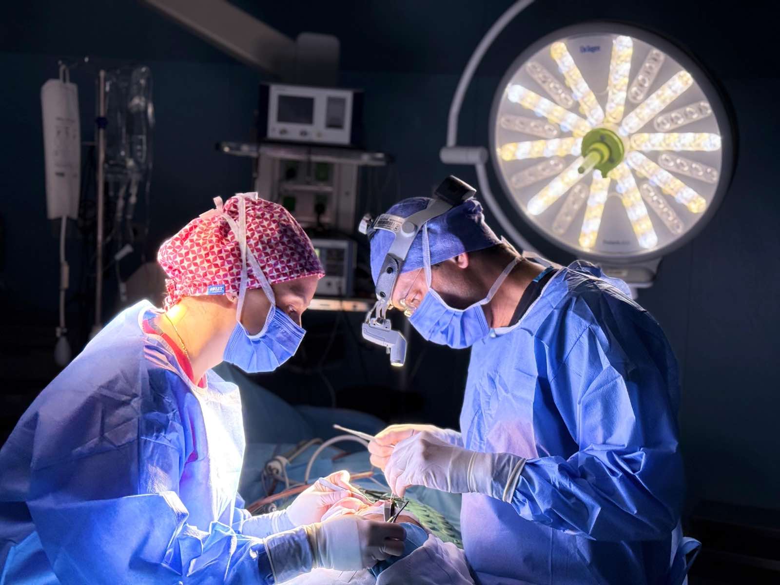 Professional surgical team in action in an operating room with focus on precision and teamwork