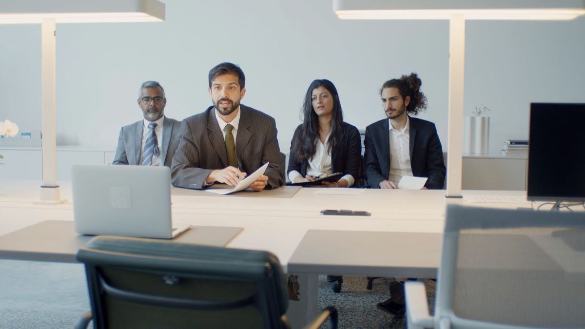 International regulatory team coordinating across regions by video conference