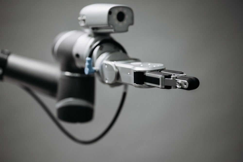 Close-up of a robotic arm showcasing advanced technology and innovation in an indoor environment