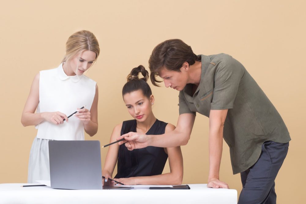 A design team reviewing user research together