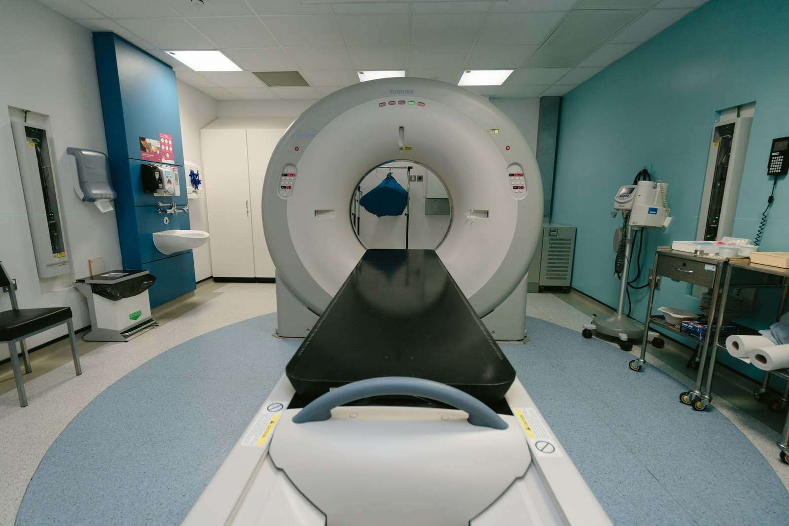 A high-tech MRI machine in a hospital examination room