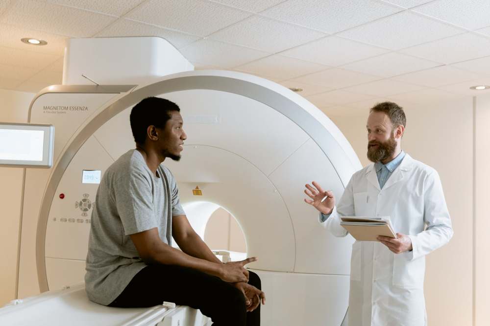 A doctor discussing MRI scan results with a patient