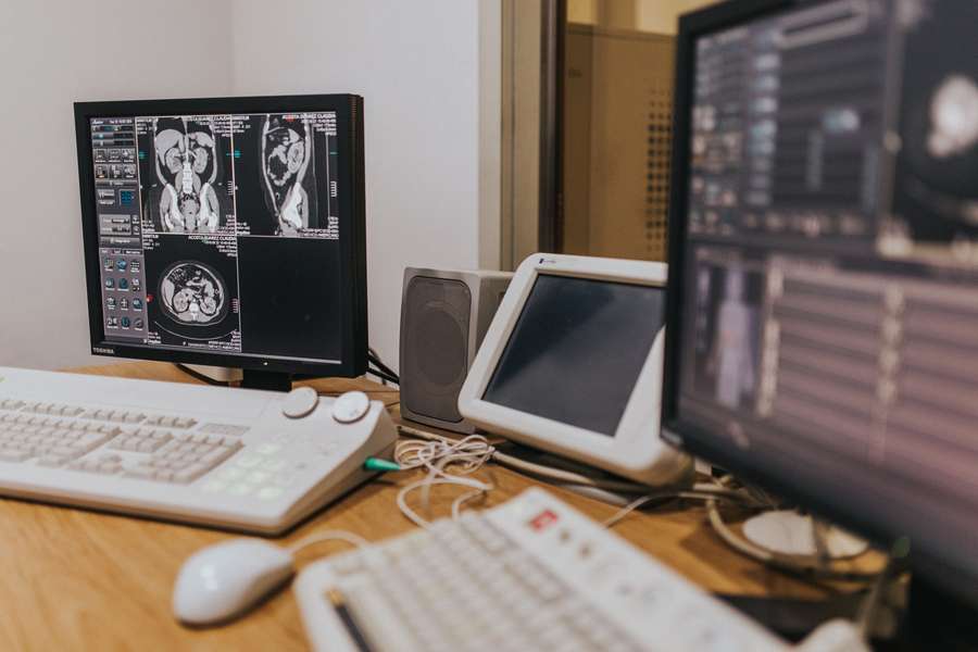 Medical imaging software displayed across clinical review monitors