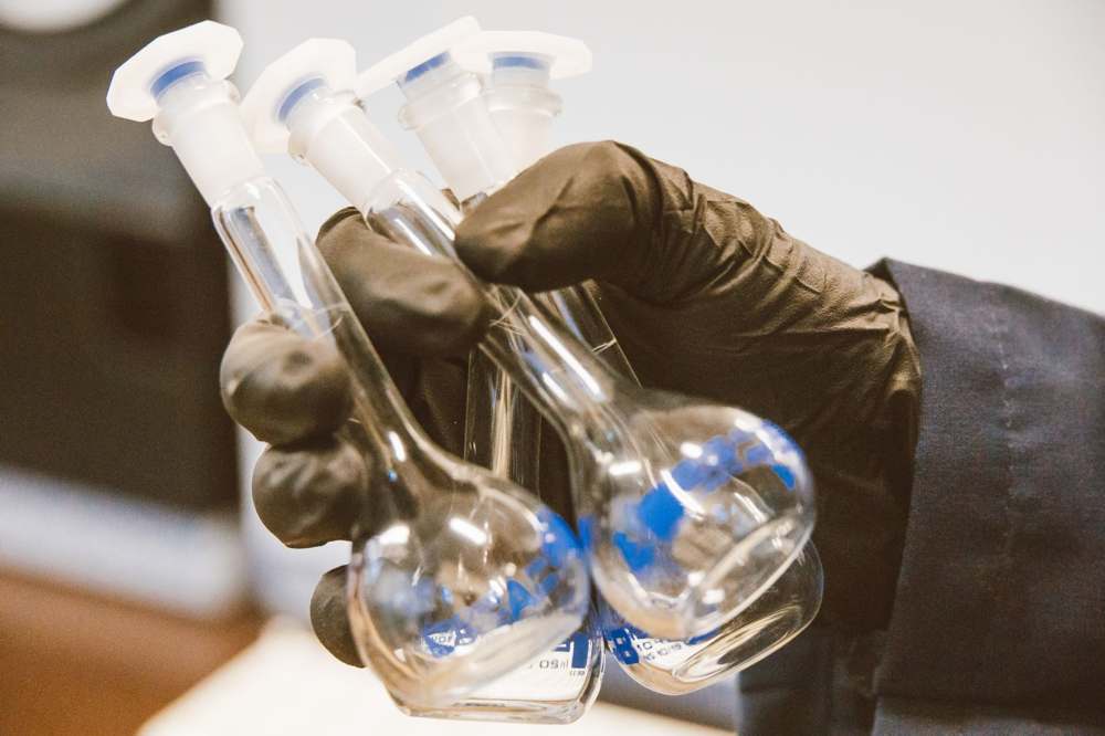 Laboratory glassware being handled in a sterile production environment