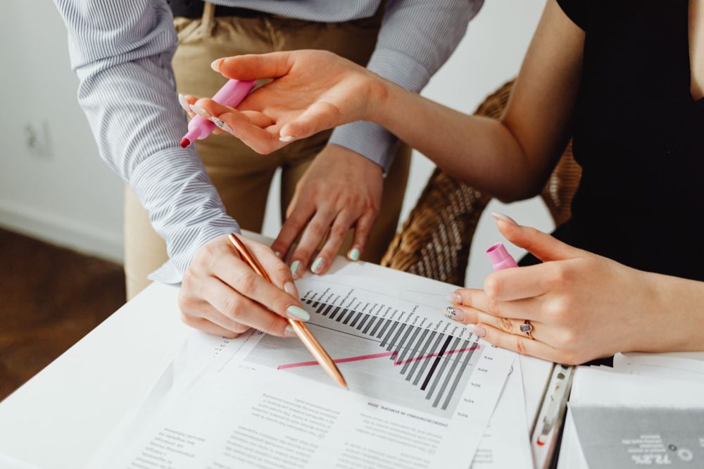 Regulatory professionals reviewing packaging artwork together