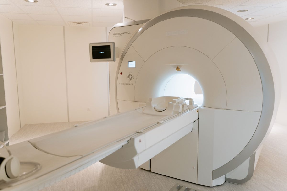 An MRI scanner standing idle in a hospital imaging suite