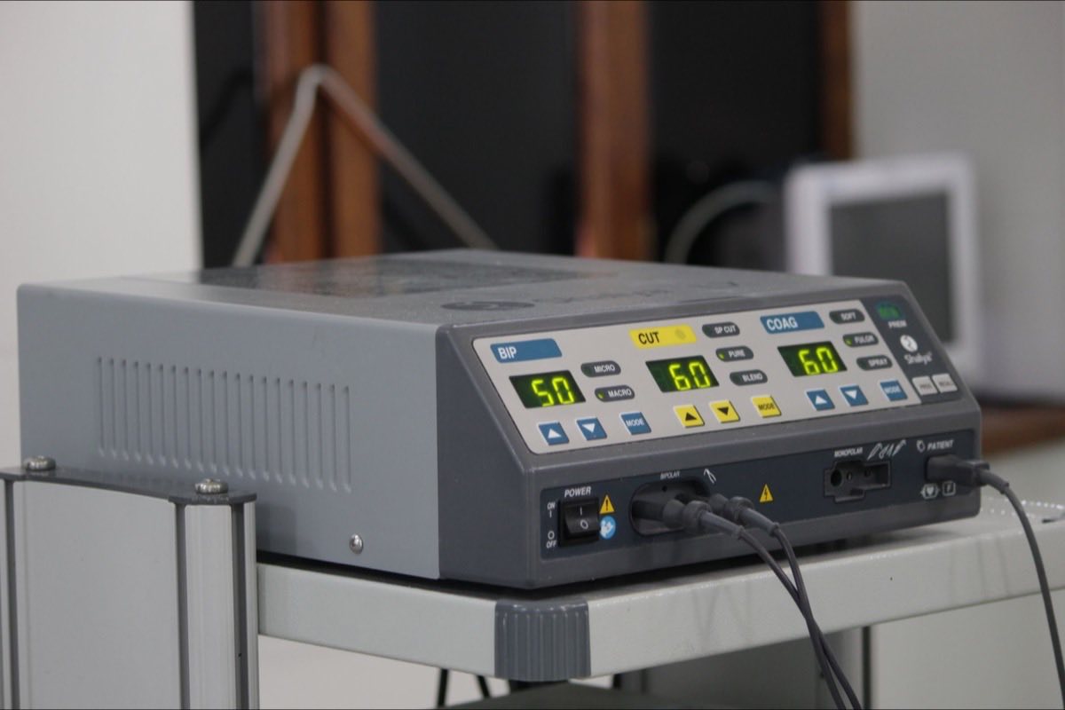 Biomedical engineer testing a medical device in a laboratory