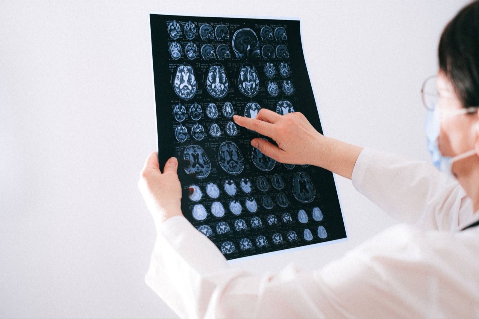 Clinician reviewing diagnostic imaging on a medical monitor