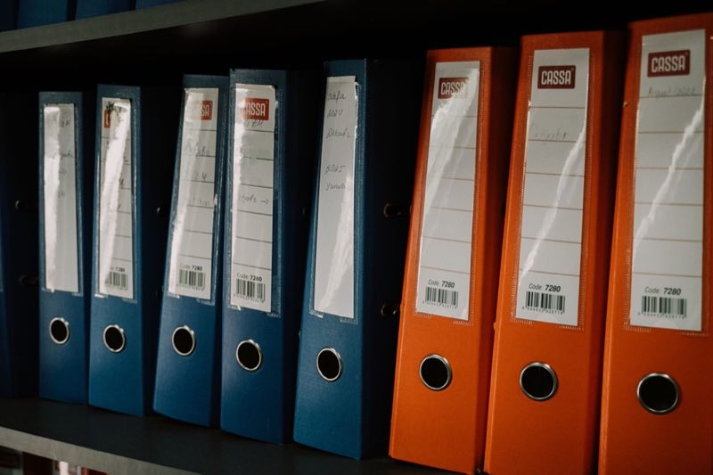Template libraries and controlled documents organized on an archive shelf