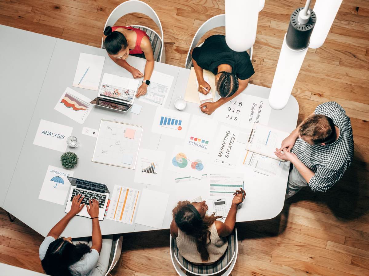 A team collaborating on marketing strategy in a modern office