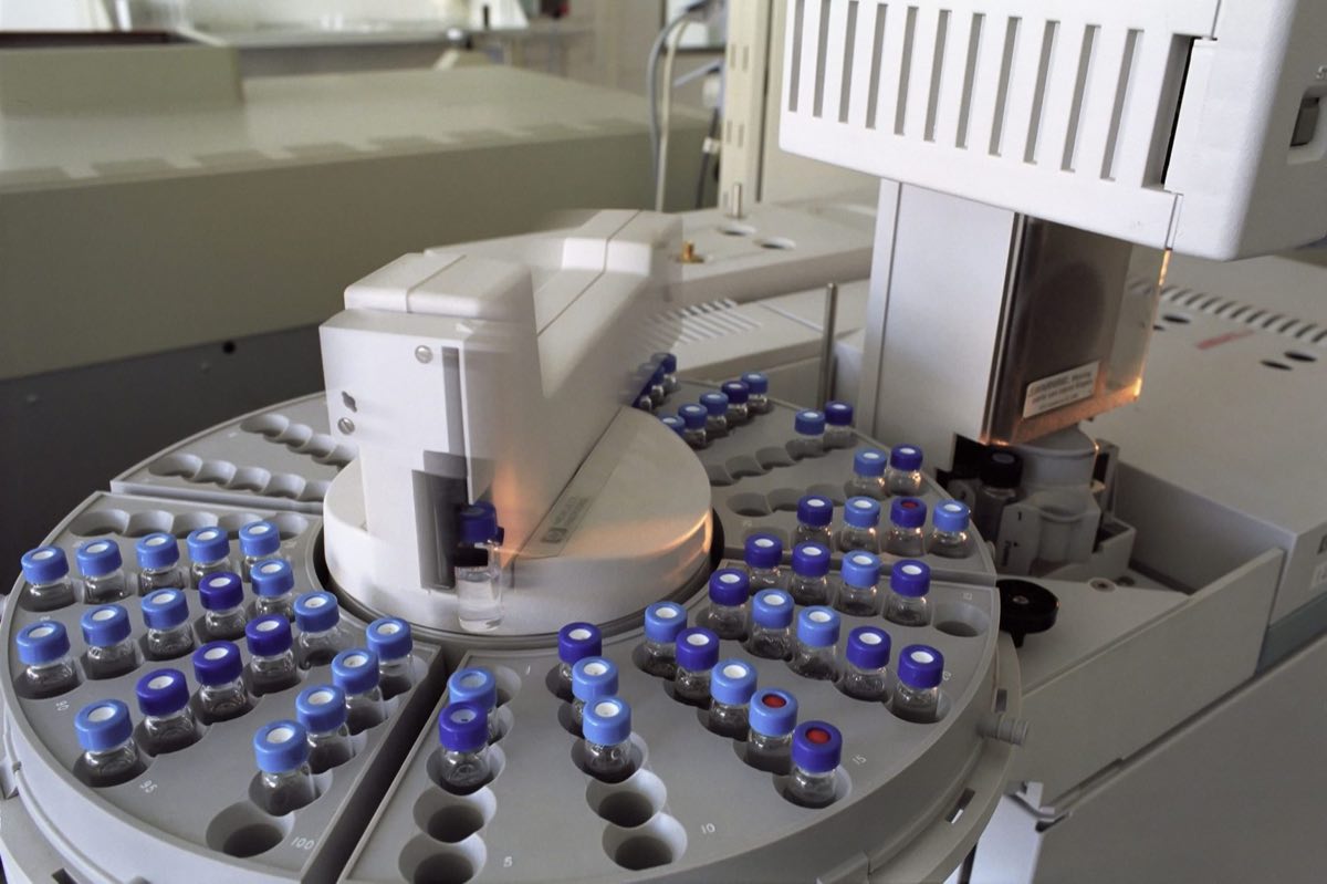 High-tech laboratory equipment with rows of sample vials
