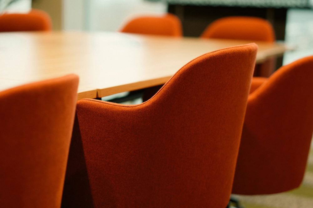 A modern conference room set for a meeting