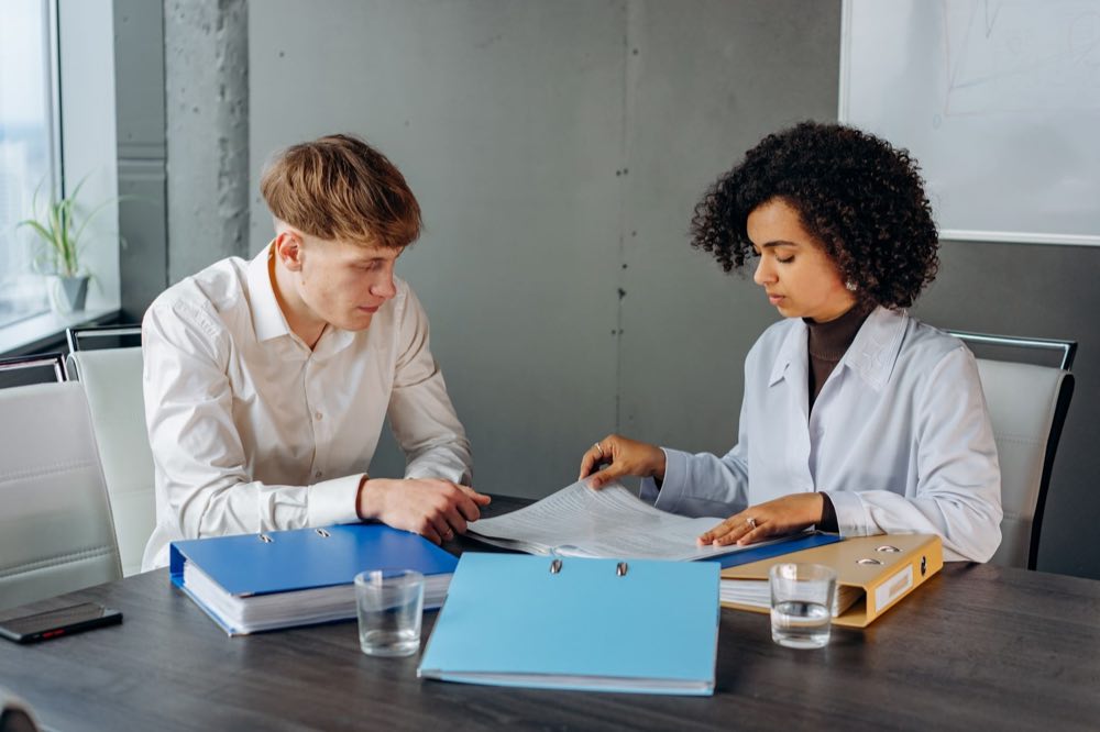 Quality lead reviewing a working quality management system
