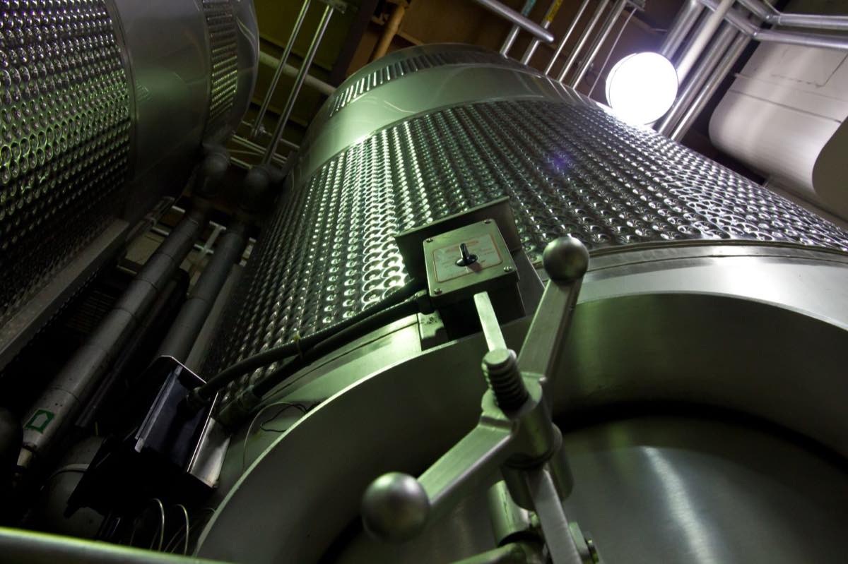 Stainless steel manufacturing tanks in a pharmaceutical production facility