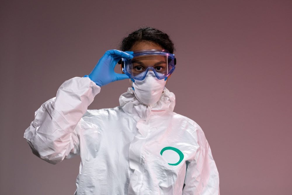 CMC practitioner gowned for the production floor where the process becomes the product