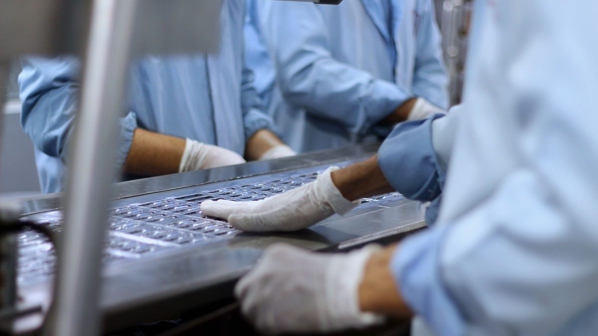 Operators overseeing a manufacturing process