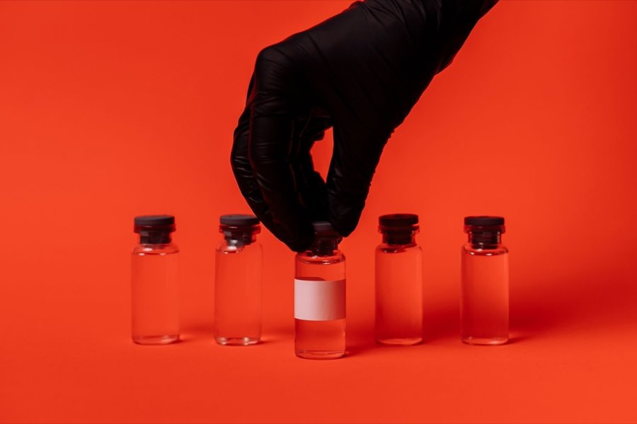 Vials on a laboratory bench representing biologic drug products