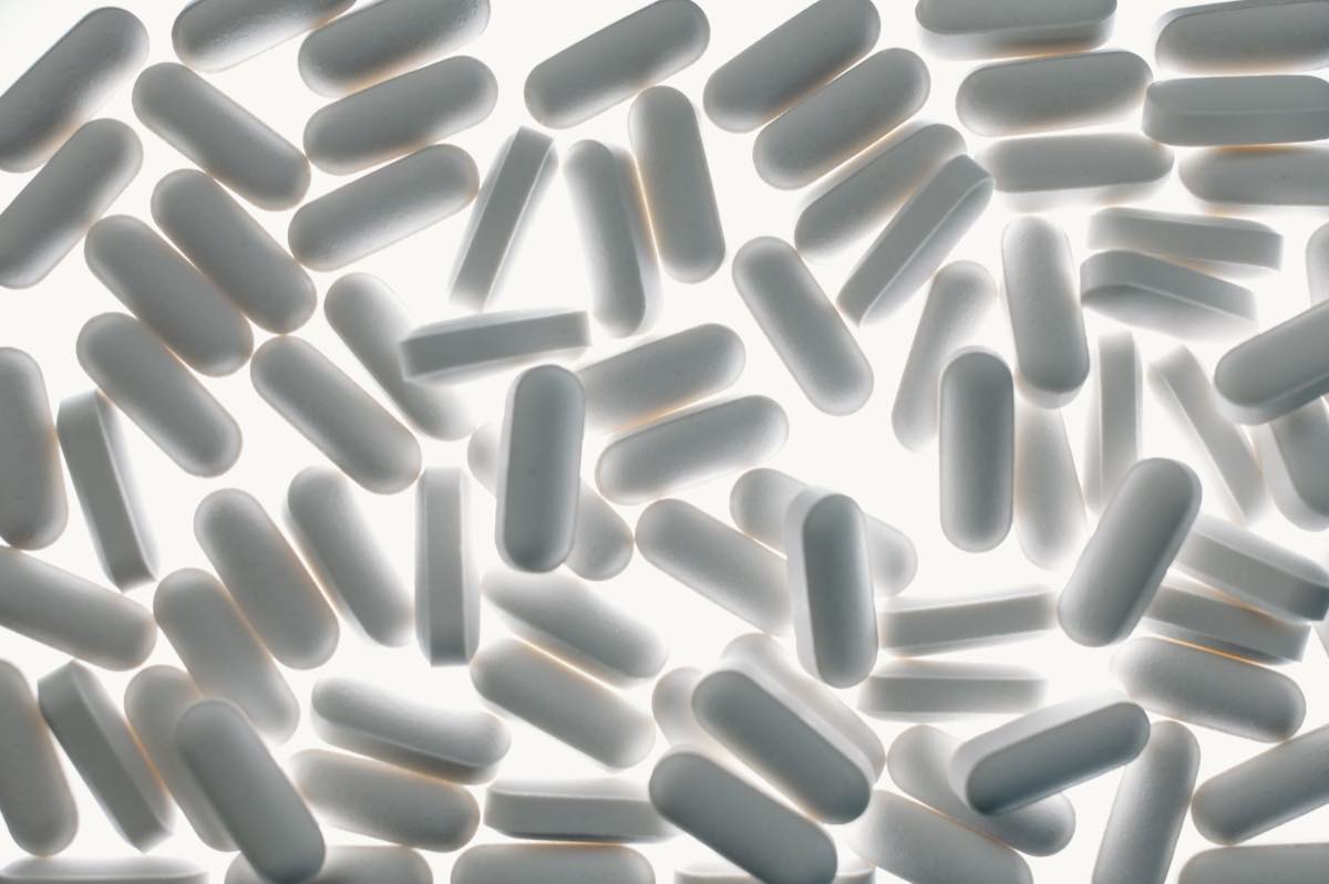 Macro view of white pharmaceutical capsules