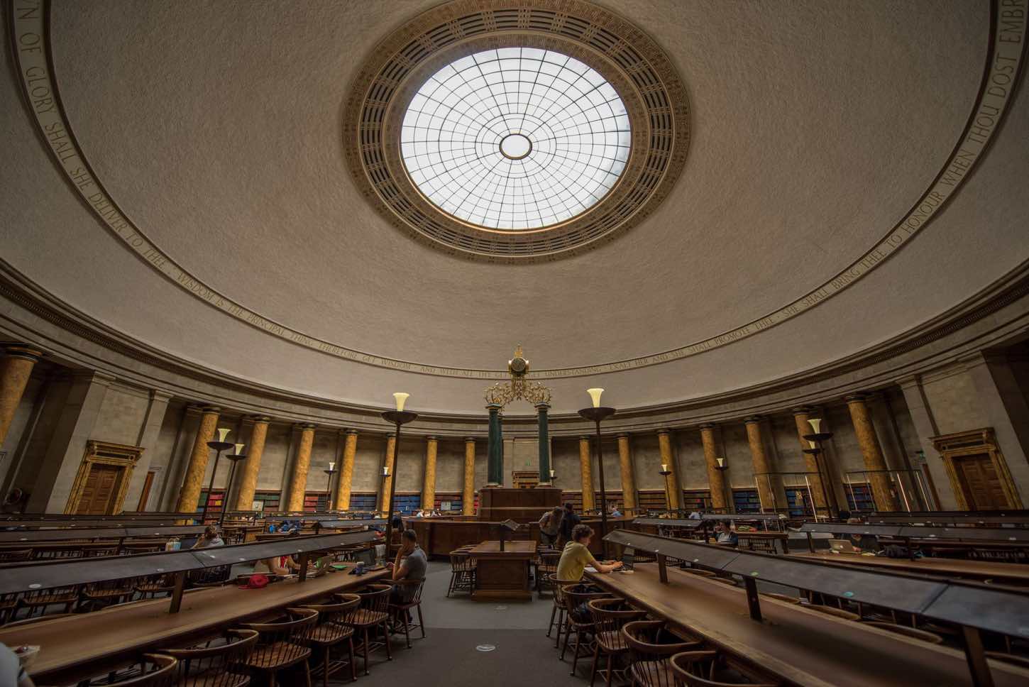 A grand archive reading room, evoking a bound regulatory dossier