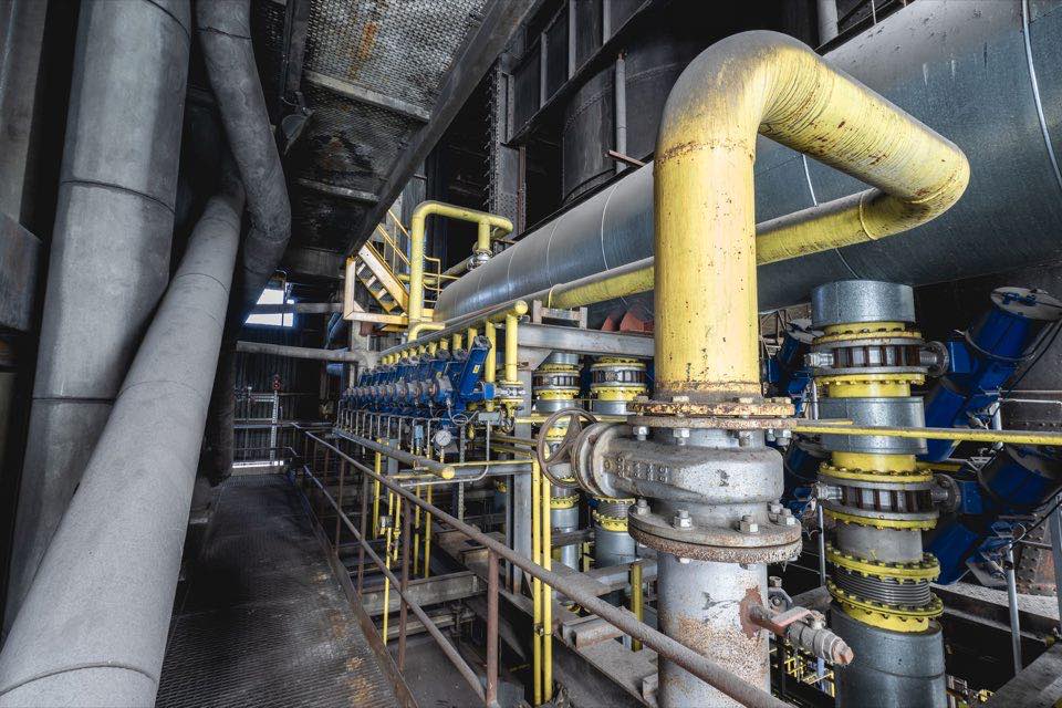 Valves and gauges along an industrial process line