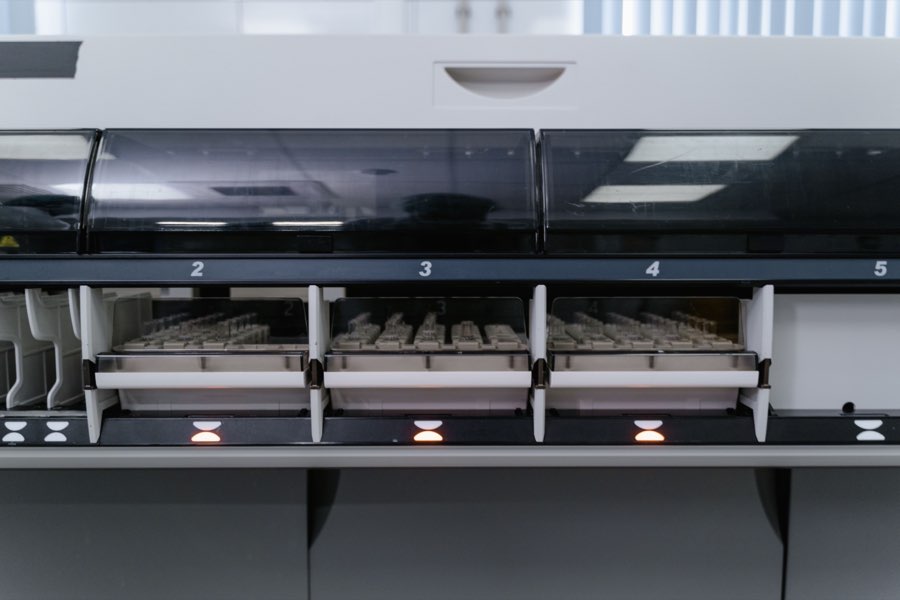 An automated clinical analyzer running a diagnostic assay