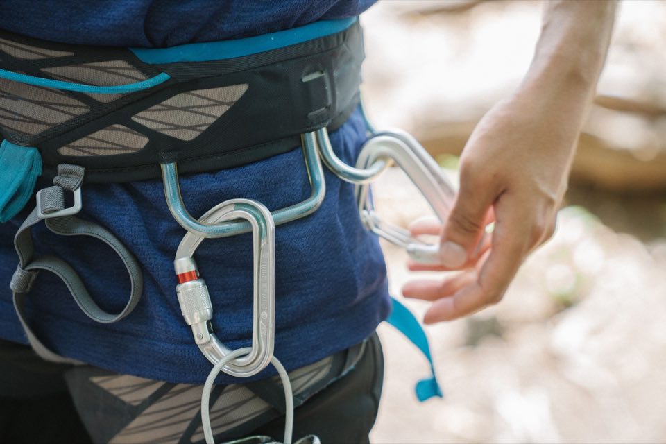 Climbing harness and carabiners cinched and checked