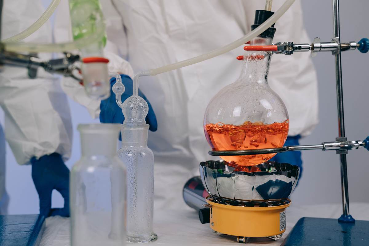 Scientists conducting a chemical experiment in a laboratory