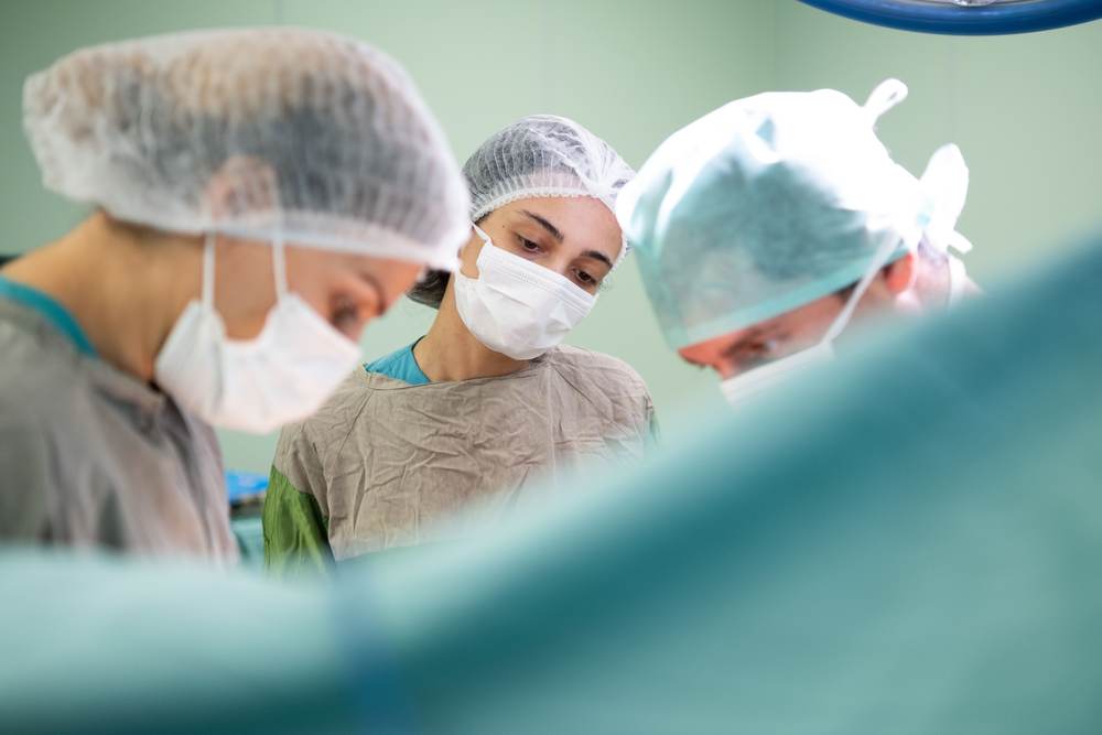 A focused surgeon during an operation