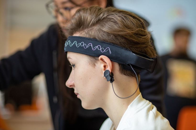 Research participant wearing an EEG headset