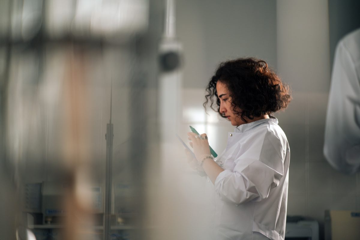 Women's-health regulatory scientist reviewing study data